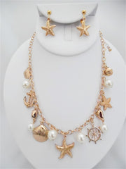 Clip on gold starfish, shell, white pearl charm necklace and earring set