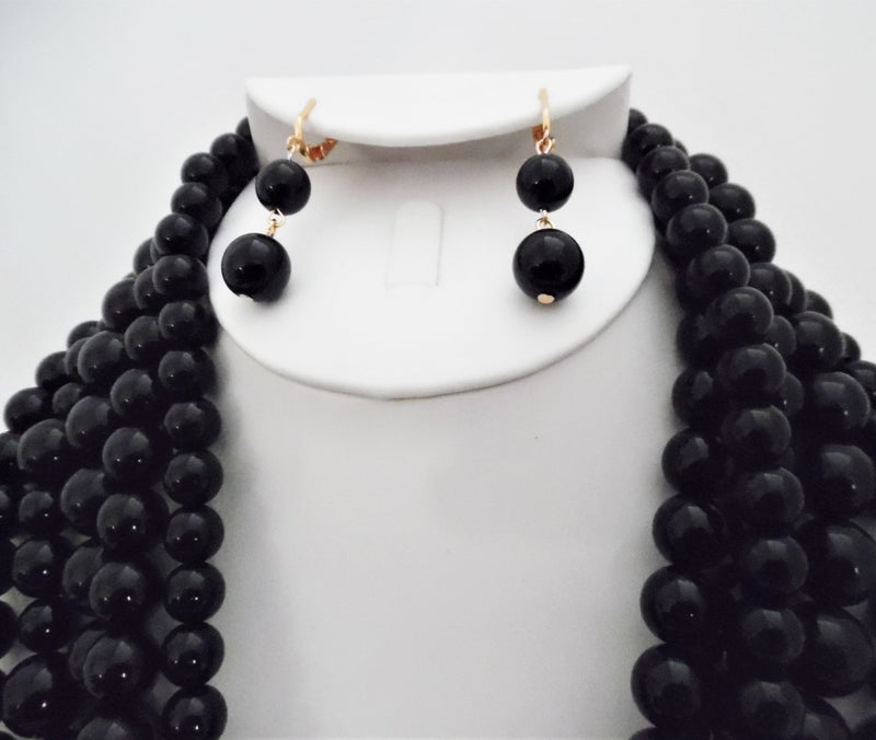 Clip on gold multi strand black bead dangle necklace and earring set