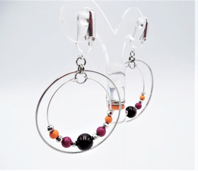 Clip on 2 1/2"  silver double hoop earrings with pink, purple & orange beads