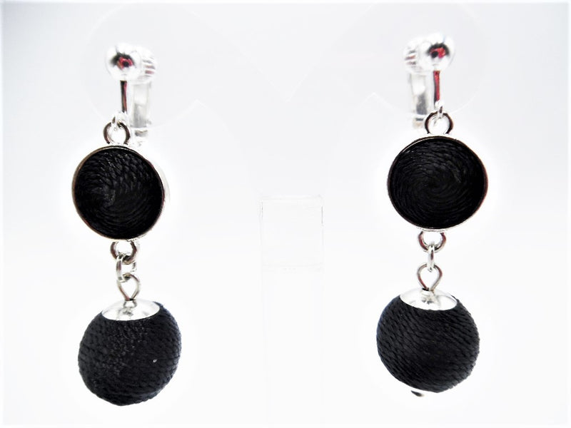 Clip on 2 1/4" silver and black thread dangle ball earrings