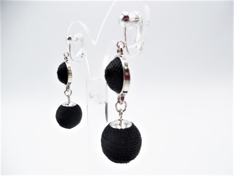 Clip on 2 1/4" silver and black thread dangle ball earrings