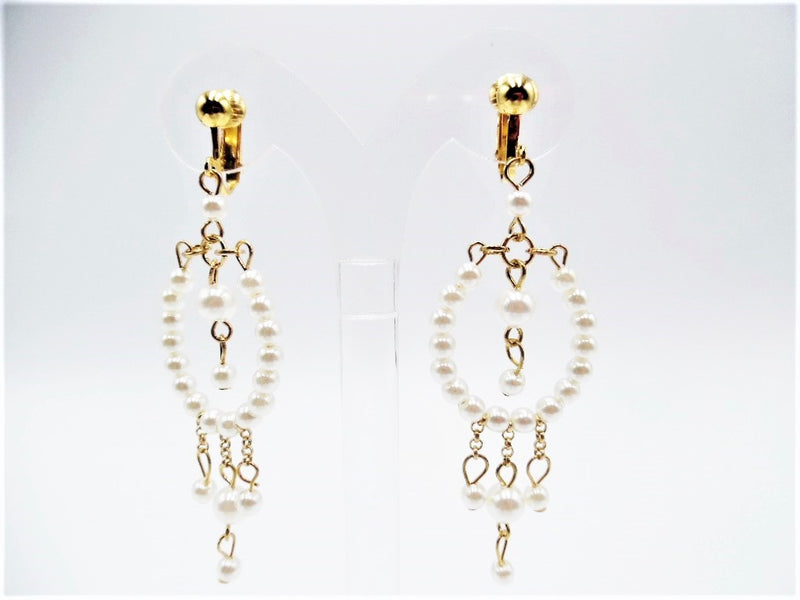 Clip on 2 3/4" silver and white pearl dangle earrings