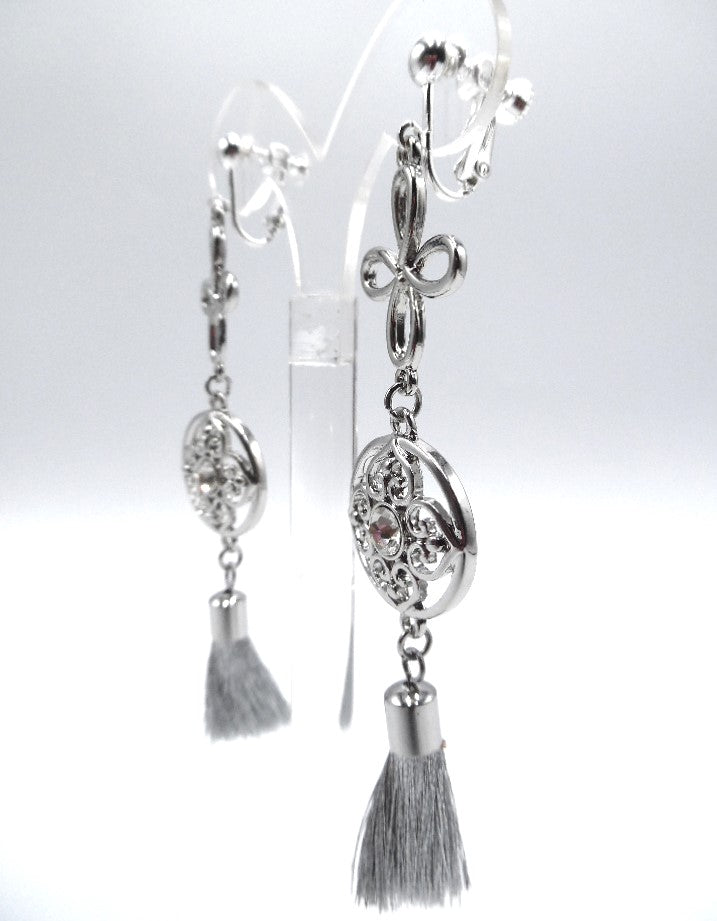 Clip on 3 3/4" silver flower and clear stone dangle earrings w/tassel