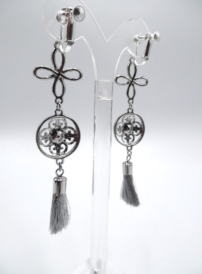 Clip on 3 3/4" silver flower and clear stone dangle earrings w/tassel