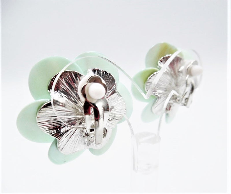 Clip on 1 1/2" silver and green shell flower earrings with center white pearl