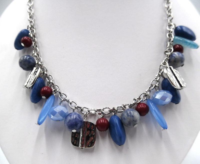Clip on silver chain, blue, and red bead necklace and earring set