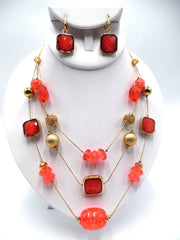 Clip on multi strand gold and orange-peach bead necklace set