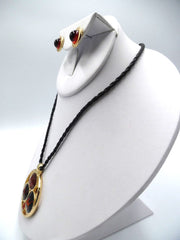 Pierced gold and brown stone black cord necklace and earring set