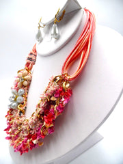 Clip on gold multi strand pink fabric flower necklace and earring set