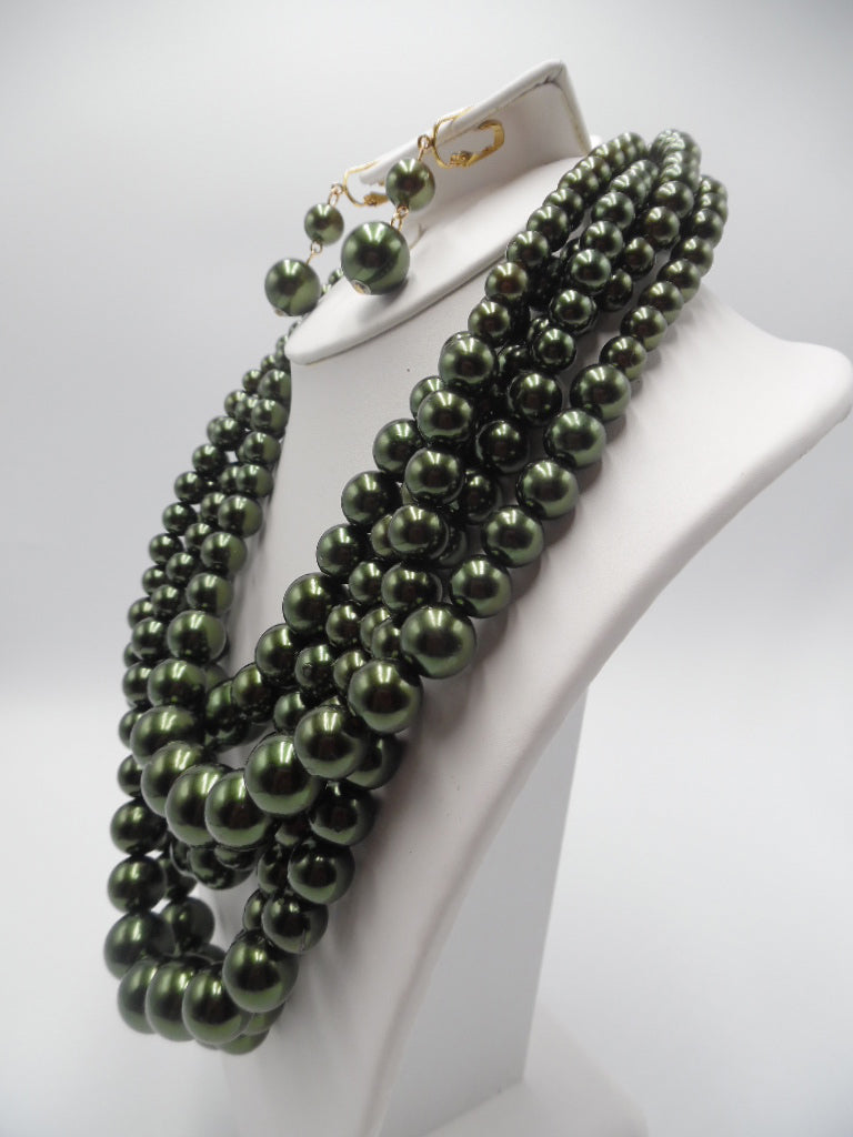 Beautiful clip on gold and green 5 strand pearl necklace and earring set