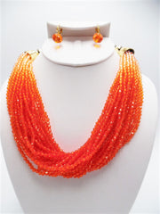 Clip on gold and orange ombre necklace and earring set