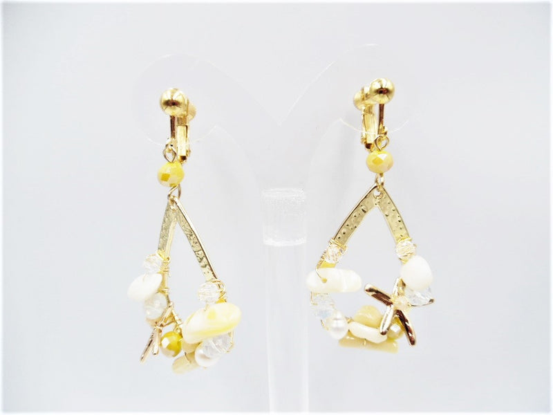 Clip on 2 1/2" gold teardrop starfish earrings with cream bead earrings