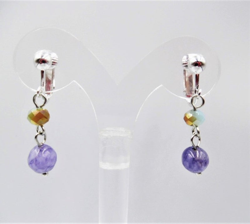 Clip on 1 1/2" silver white, brown and purple bead dangle earrings