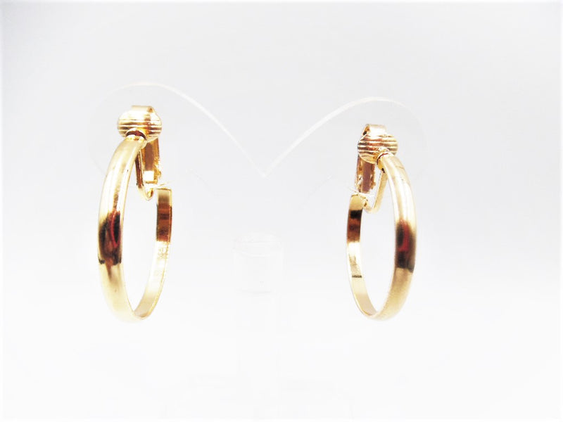 Clip on 1 1/4" shiny gold open back hoop earrings
