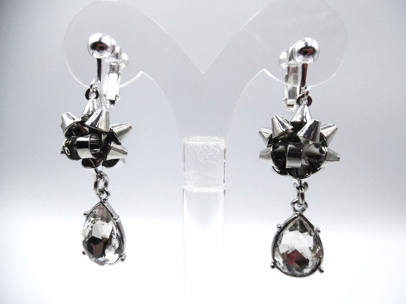 Clip on 2" silver Christmas bow earring with dangle clear stone