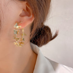 DSN Pierced gold butterfly hoop earrings