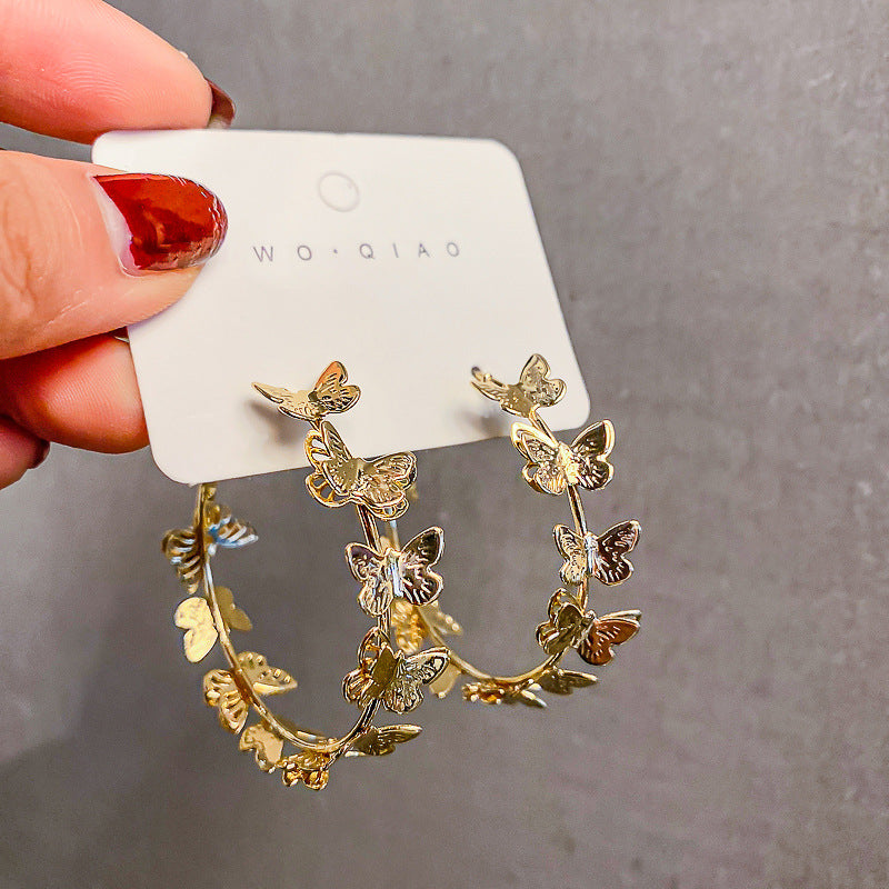 DSN Pierced gold butterfly hoop earrings