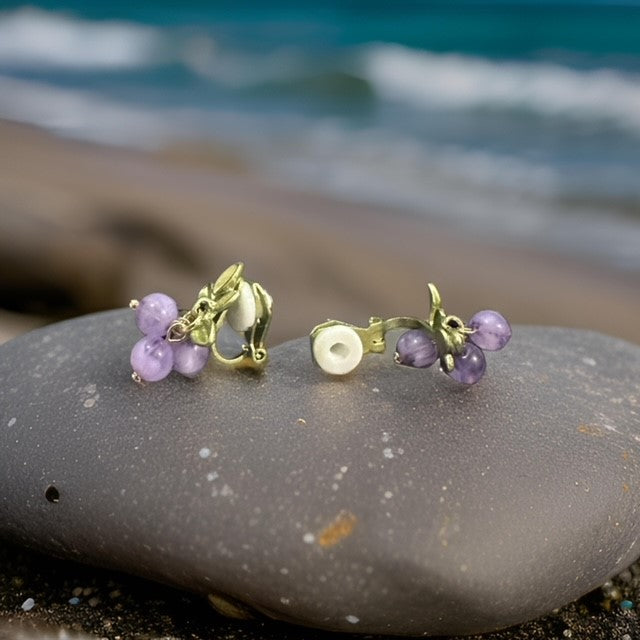 Clip on 3/4" small gold flower earrings with purple dangle beads