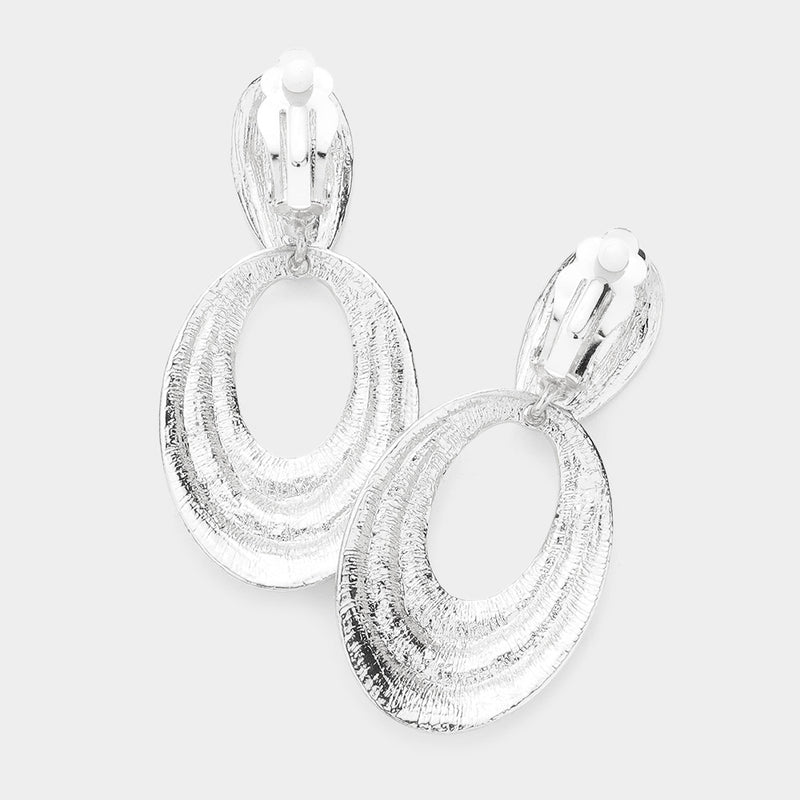 Clip on 2 3/4" silver cutout oval raised indented dangle earrings