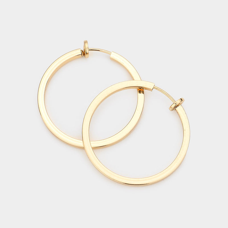 Clip on 1 1/4" gold straight edge spring back hoop earrings