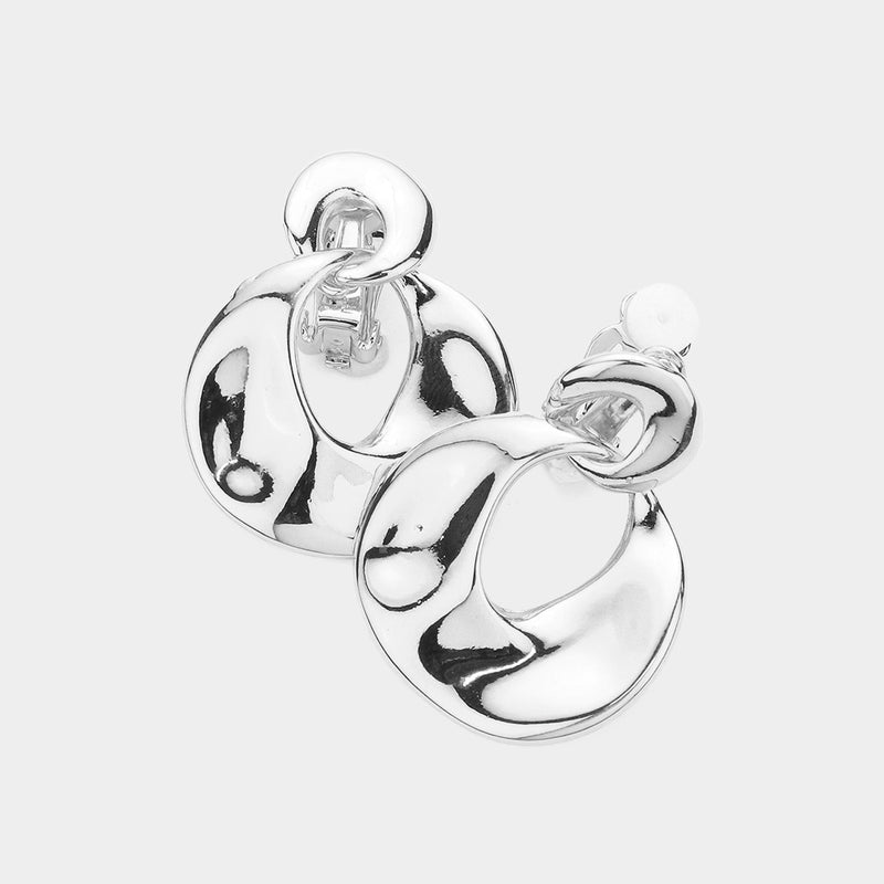 Clip on 1 1/2" shiny silver cutout bent dangle hoop style earrings