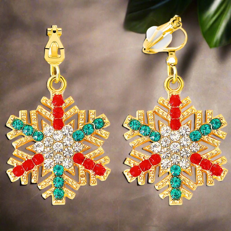 Clip on 1 1/4" gold, green, red & clear stone dangle snowflake earrings