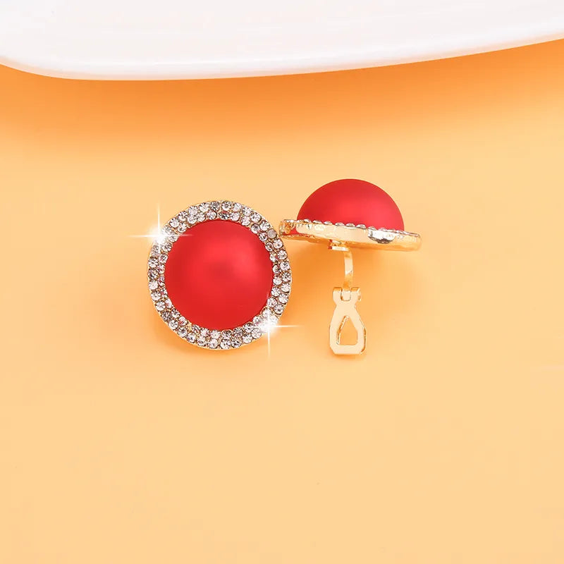 Trendy clip on 1" gold round red stone earrings with clear stone edges