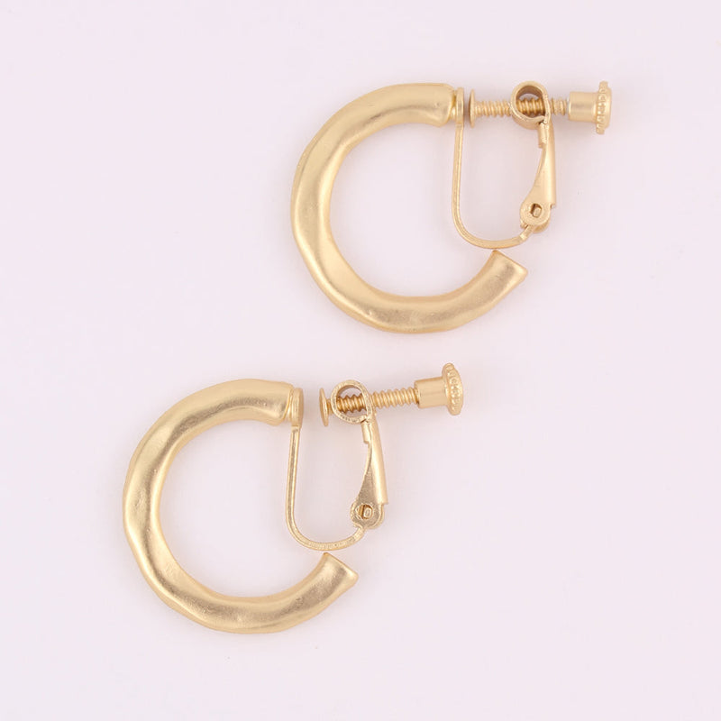 Clip on 1 1/4" matte gold hammered hoop earrings