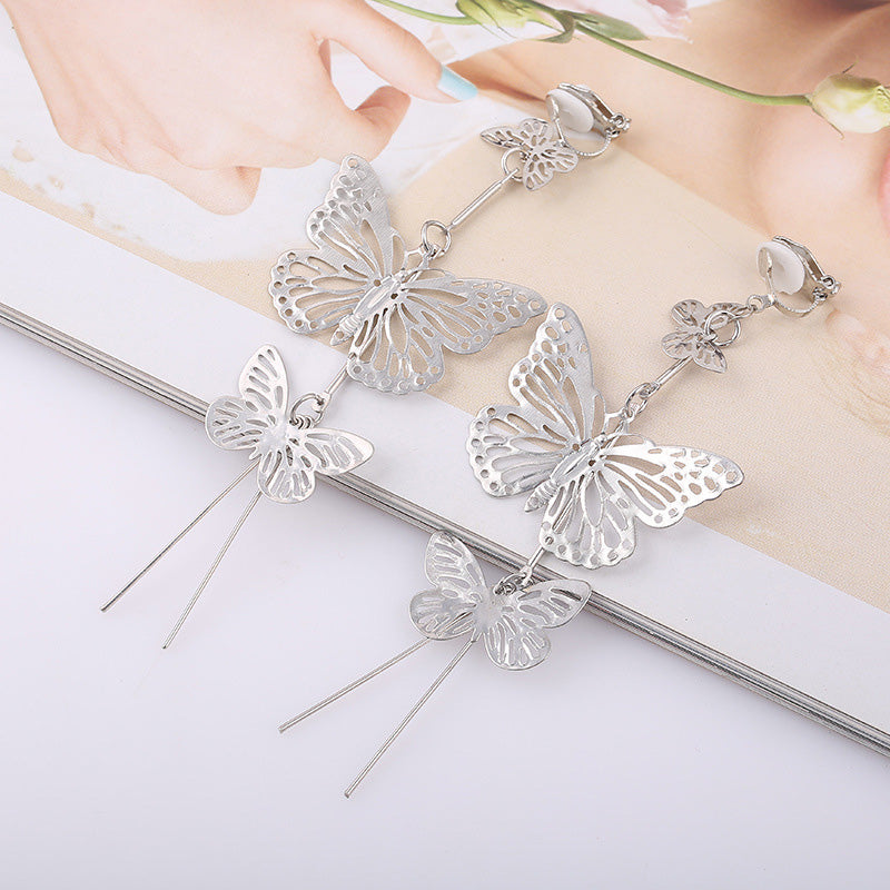 Clip on 4" long silver dangle double butterfly earrings