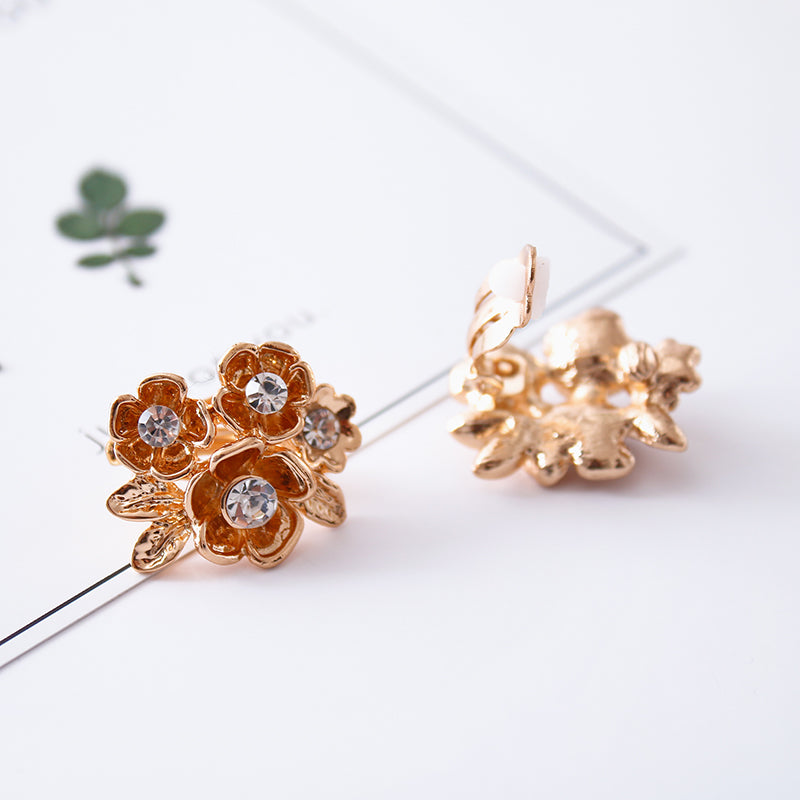 Clip on 1/2" small gold snowflake button style earrings