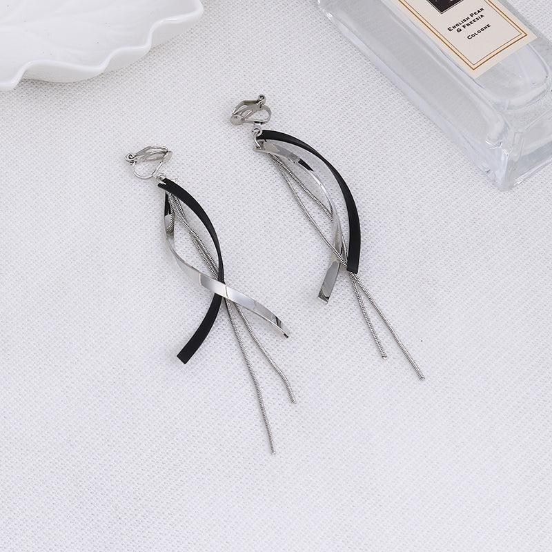 Clip on 3 3/4" long silver and black swirl chain earrings