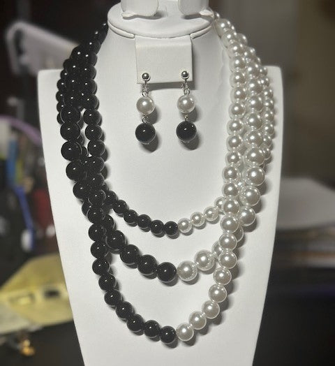 Clip on multi strand silver, black and white pearl necklace and