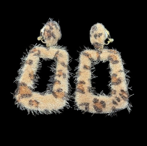 Vintage clip on 1" gold, black and white swirl button style earrings