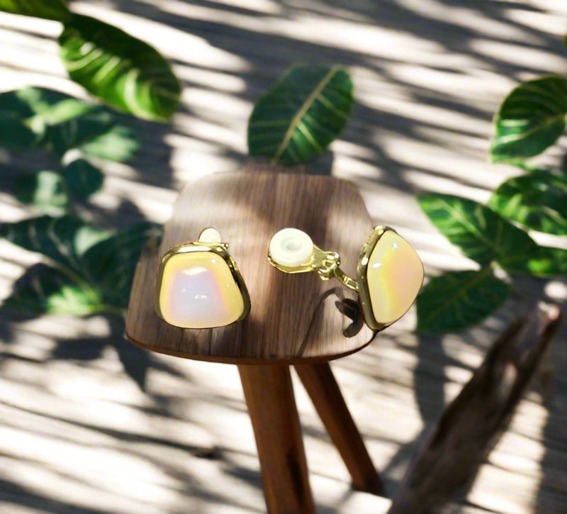 Vintage clip on 1" gold, black and white swirl button style earrings