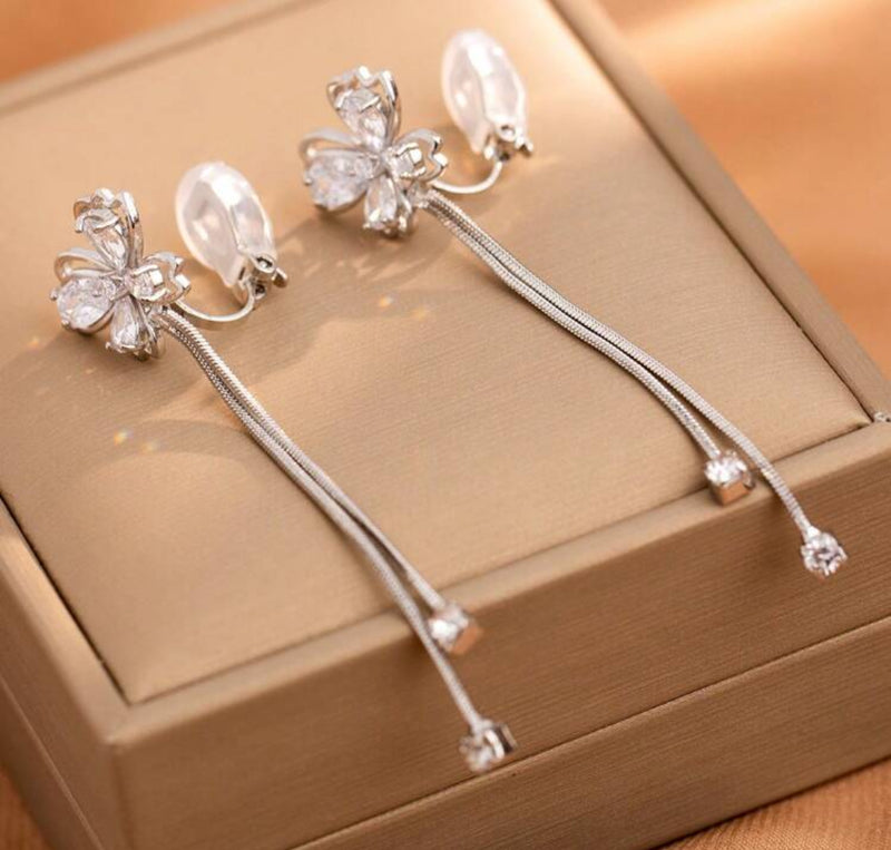 Clip on 2 3/4" silver chain and clear stone dangle butterfly earrings