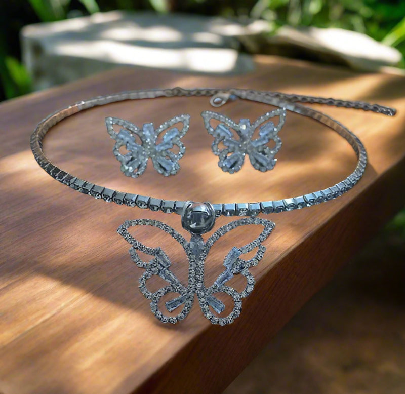Pierced silver and clear stone wire cutout butterfly necklace and earring set