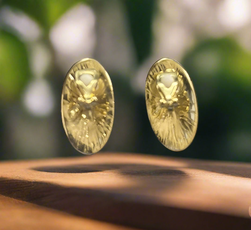 Clip on 1 1/4" gold and turquoise print skinny oval button style earrings