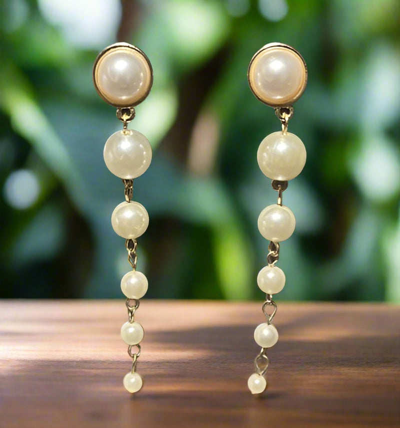 Clip on 3" gold and white pearl graduated dangle earrings
