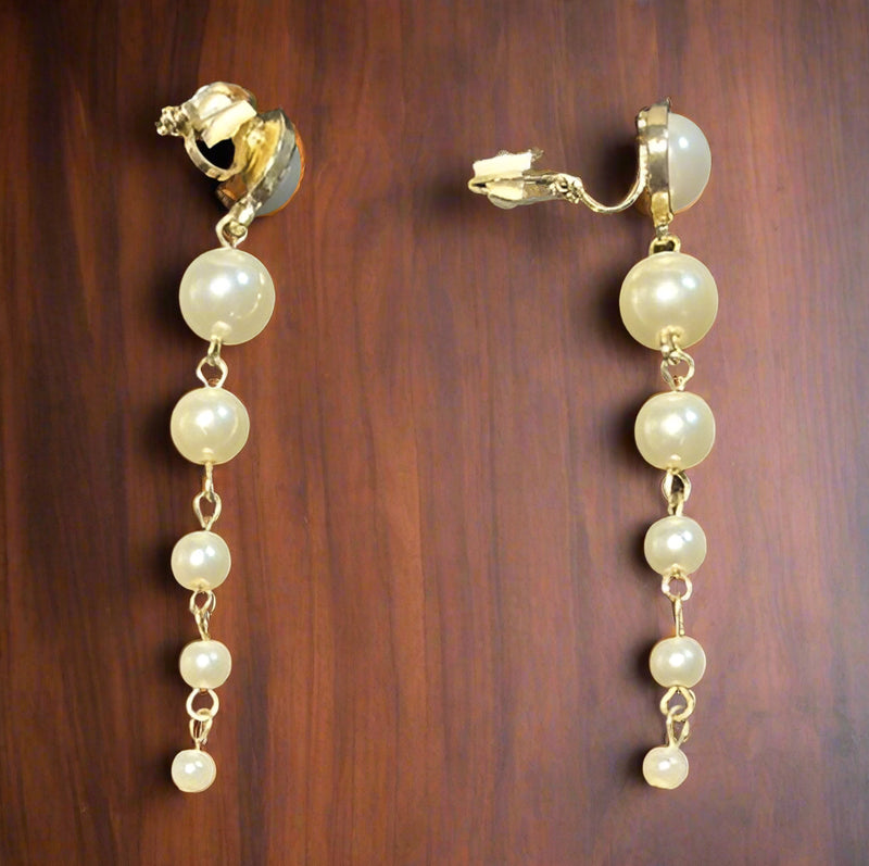 Clip on 3" gold and white pearl graduated dangle earrings