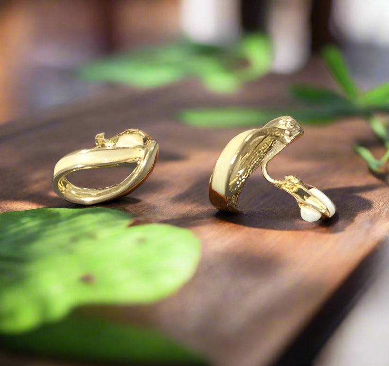 Clip on 1" gold and cream-off white bent button style earrings