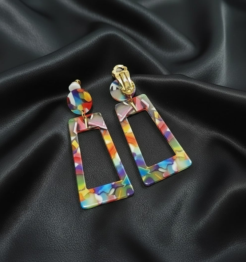 Clip on 2 1/2" gold and red multi colored dangle plastic earrings