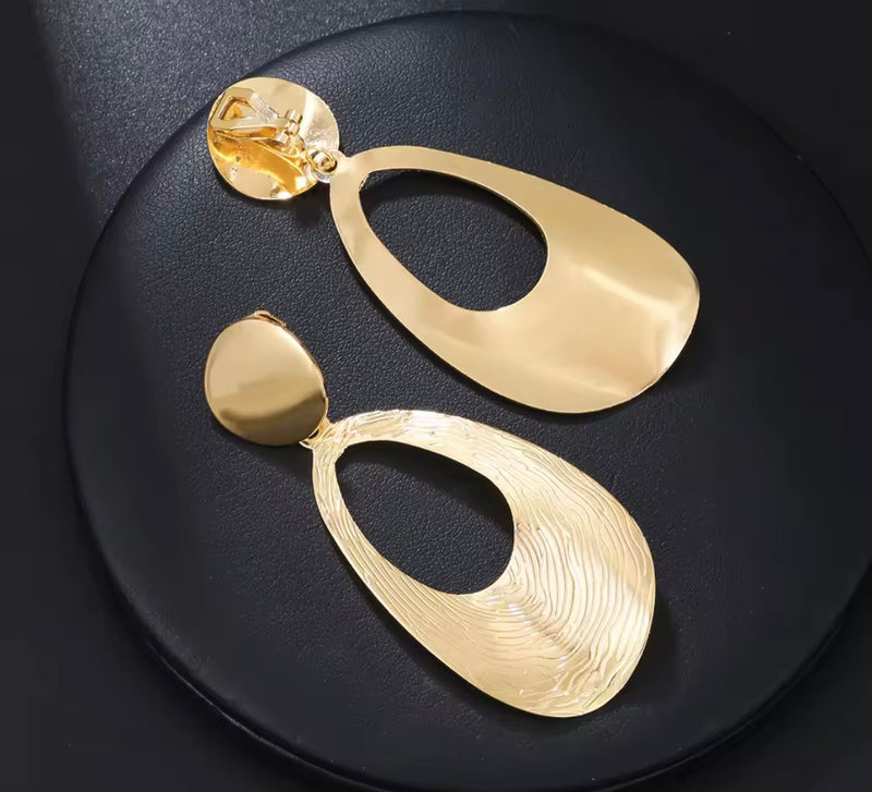 Clip on 1 1/4" large shiny gold loose woven round button style earrings