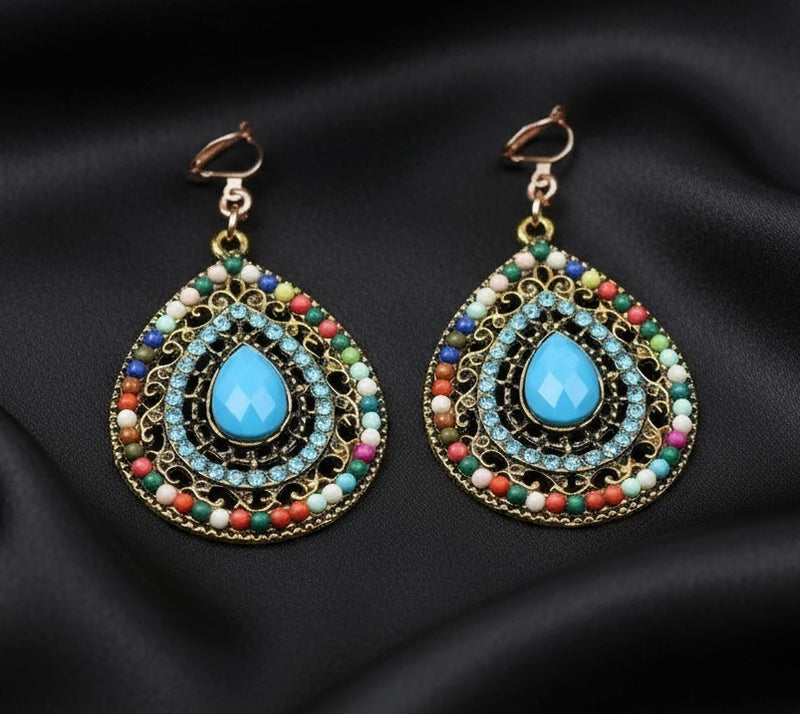 Clip on 1 1/4" large shiny gold loose woven round button style earrings