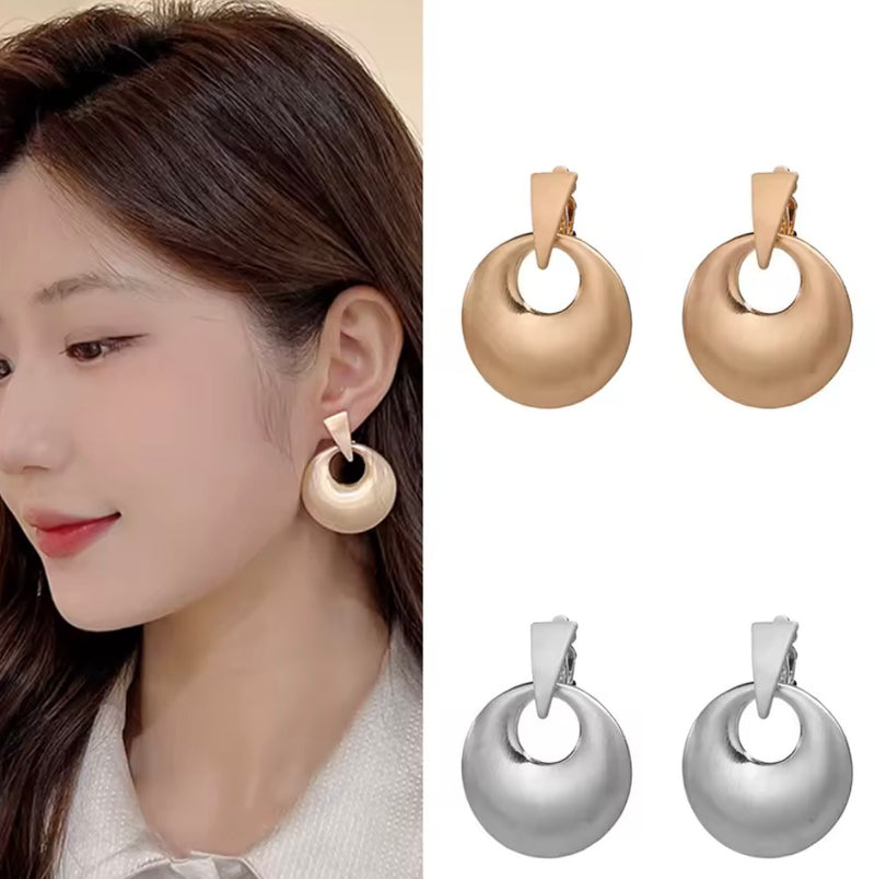 Clip on 1 3/4" matte silver raised graduated hoop earrings