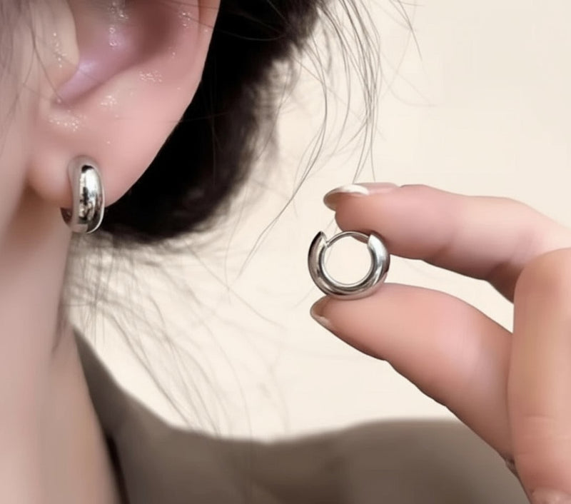 Clip on 1/2" shiny silver comfort fit coil Xsmall hoop earrings