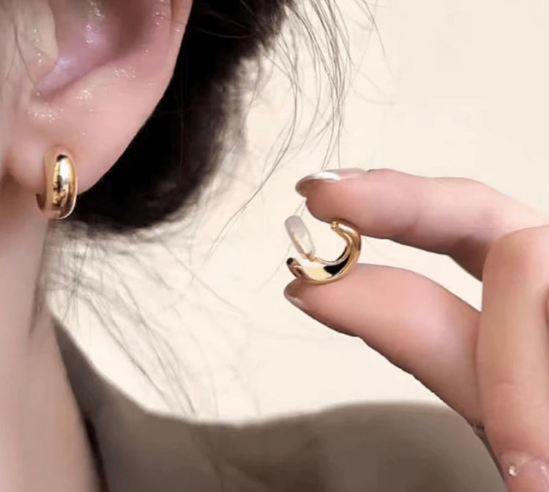 Clip on 1/2" shiny gold comfort fit coil Xsmall hoop earrings