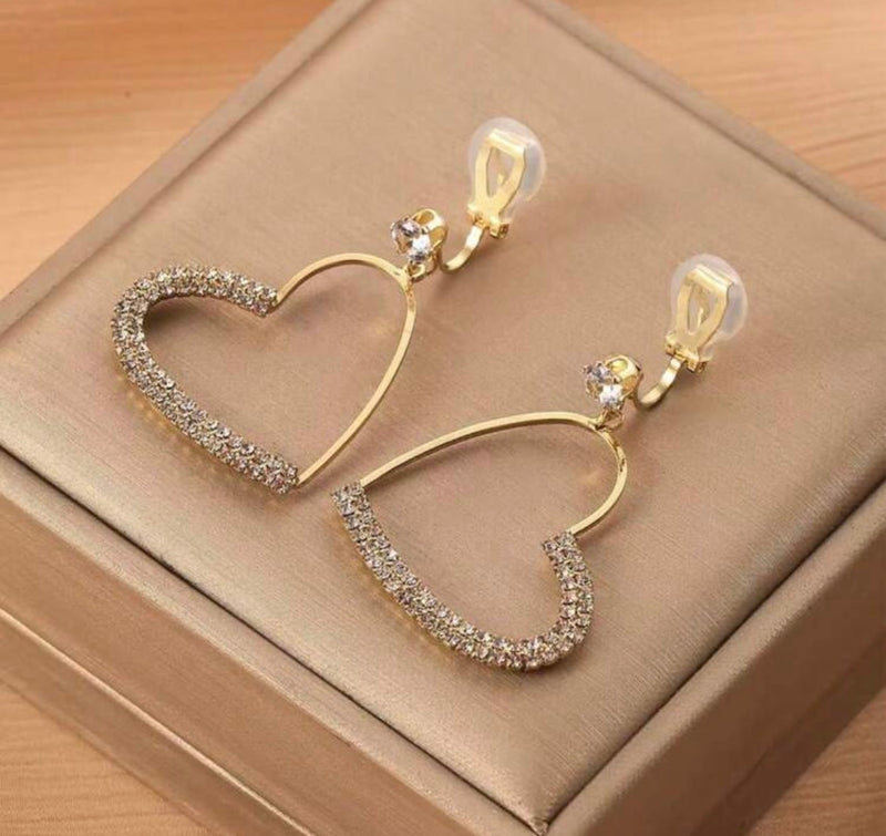 Clip on 1 3/4" gold and clear stone dangle heart earrings