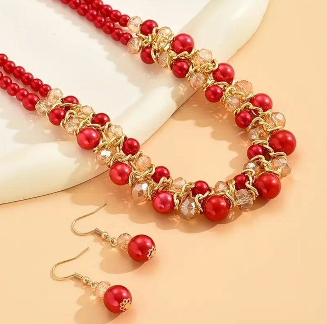 Pierced gold, red and brown bead multi strand necklace and earring set