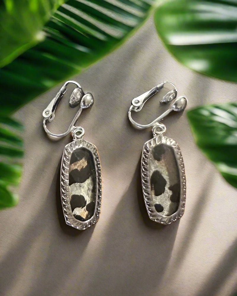 Clip on 1 1/2" silver, gray and black multi colored animal print dangle earrings