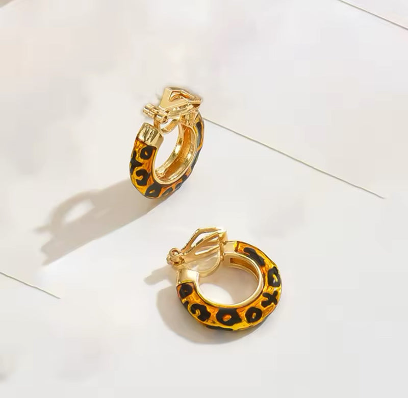 Clip on 3/4" small gold and black animal print hoop earrings